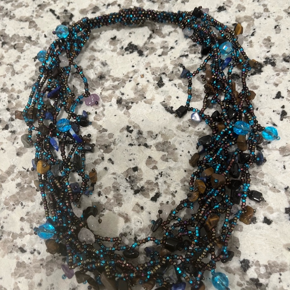 Elegant Beaded Necklace with Blue and Brown Accents